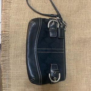 Black Coach logo wristlet.